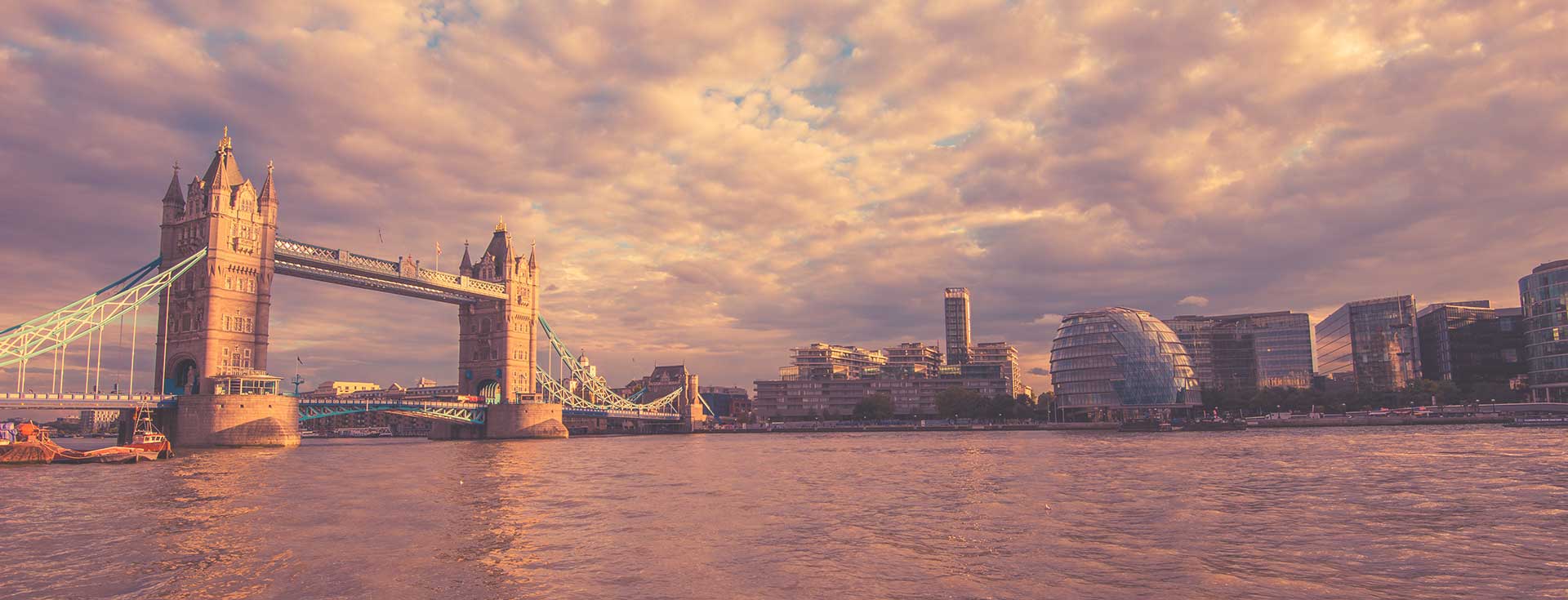 A view of the city of London with London Bridge taken from a river side